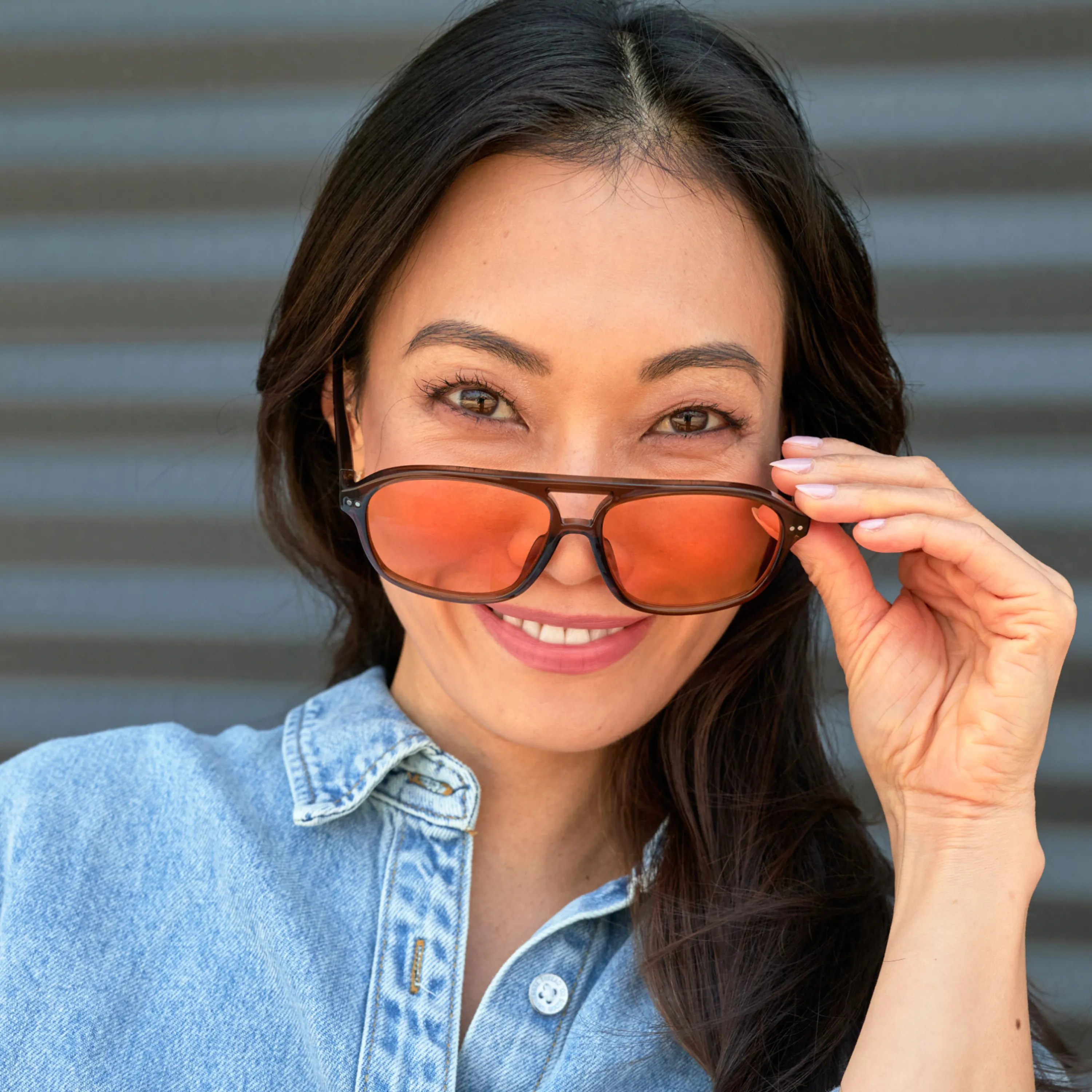 Customer wearing LOOK OPTIC Davis readers