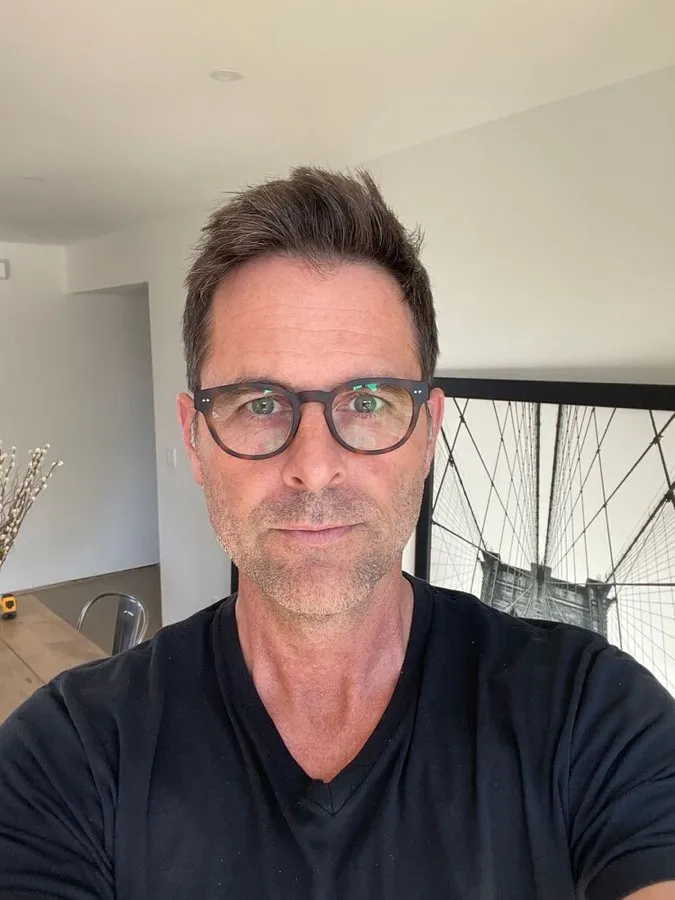 Jonathan wearing LOOK OPTIC Abbey readers in tortoise