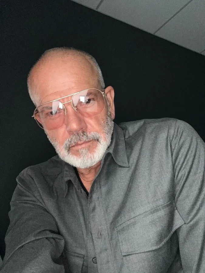 Monty in LOOK OPTIC Muse frames, silver beard and moustache