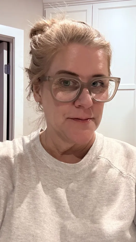 Nancy wearing LOOK OPTIC Evita readers in Taupe